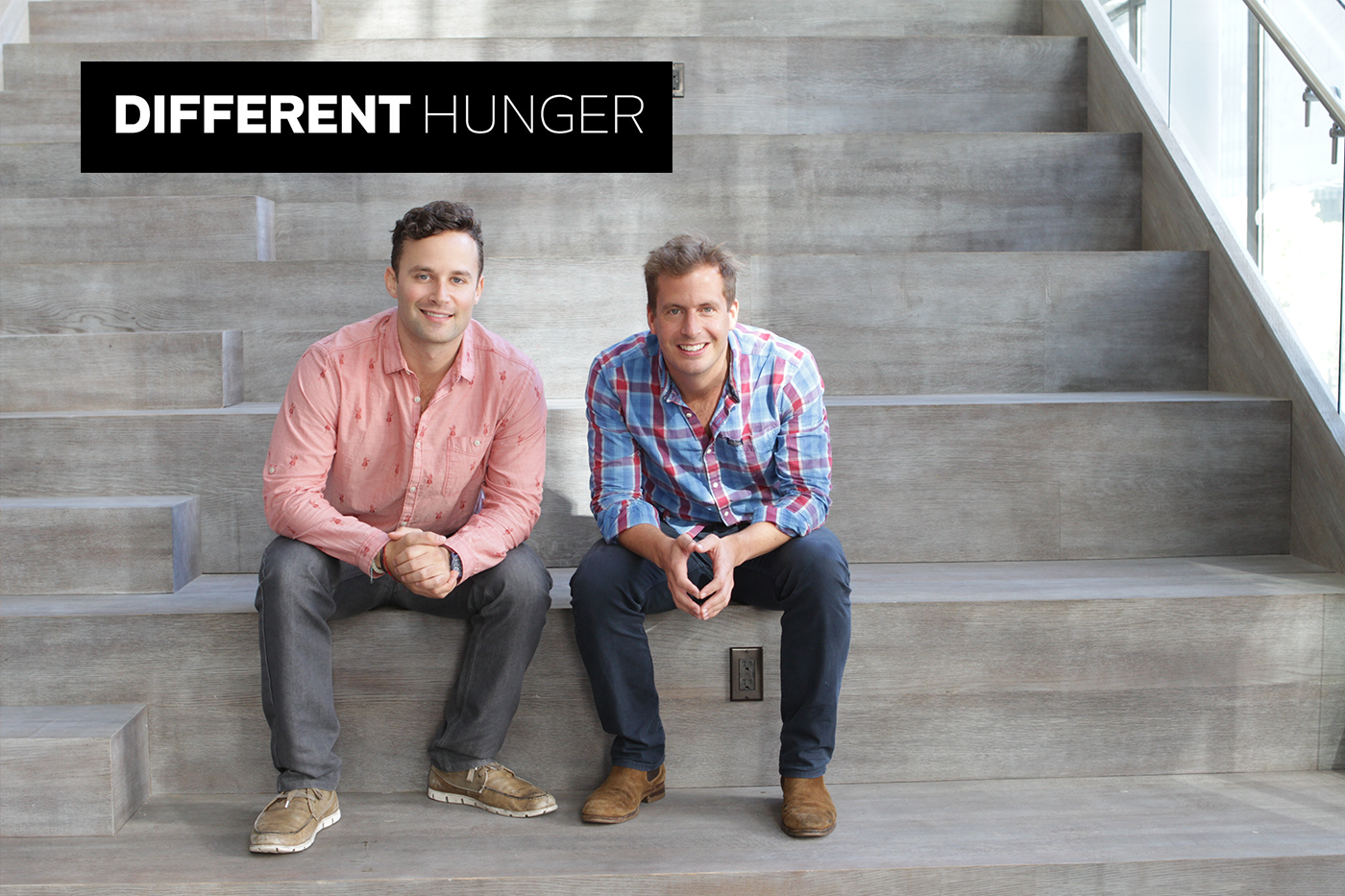 Different Hunger founders sat on steps